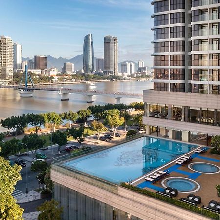 Melia Vinpearl Danang Riverfront Exterior photo The pool at the Riverfront Residences